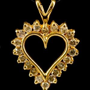 10k solid gold heart pendant with diamonds.